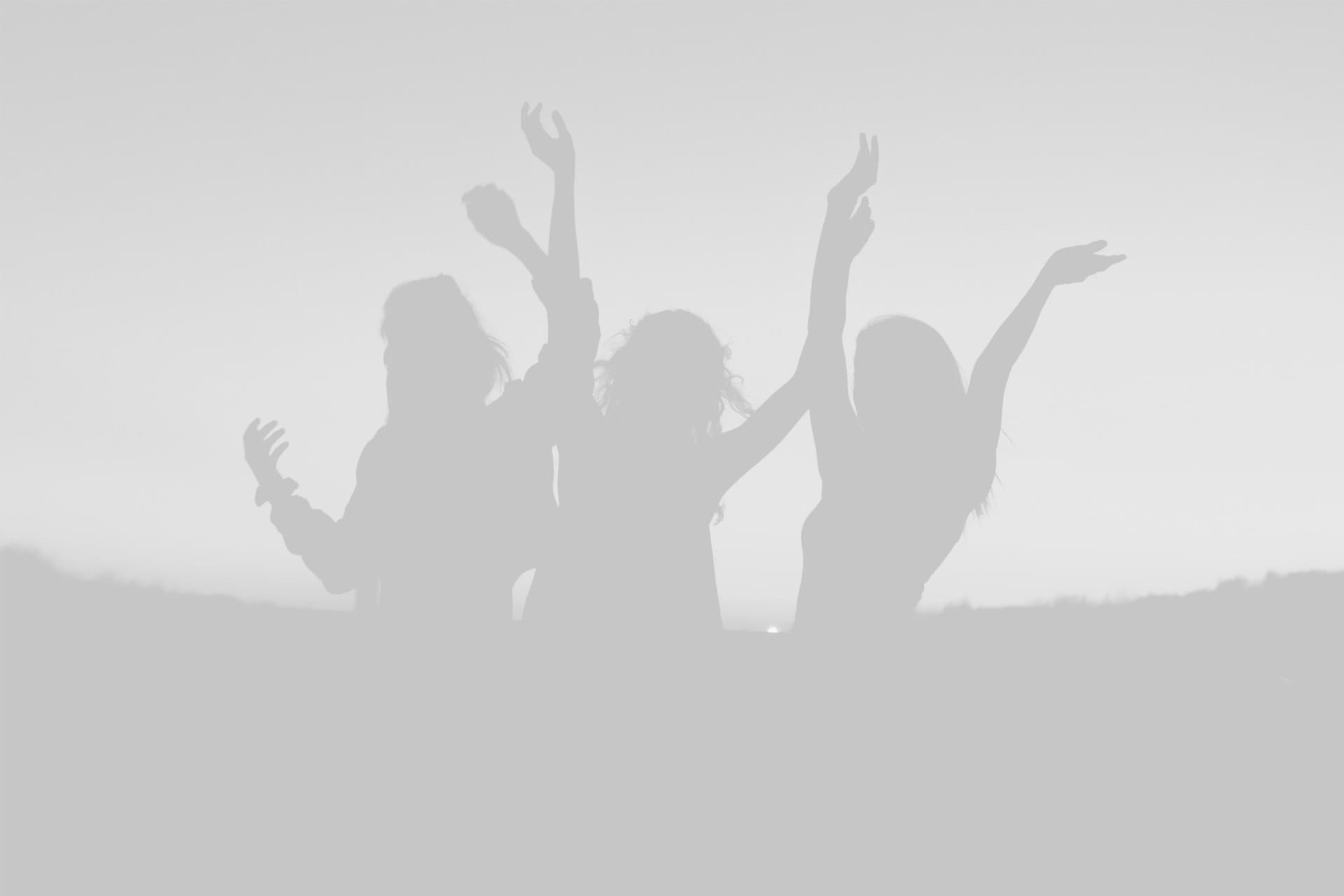 Group celebration silhouette expressing energy and collaboration
