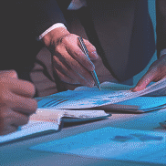 Professional hands signing business documents digitally secure