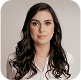 Professional headshot of woman with dark hair